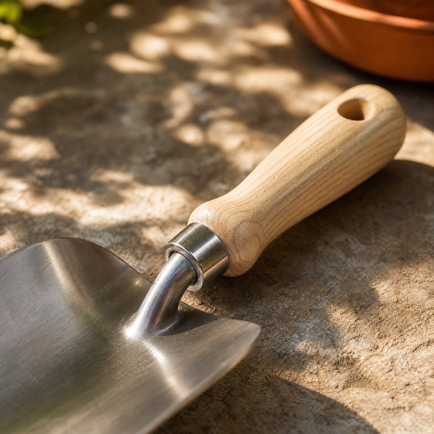 Hand Trowel, Stainless & Ash — detail of the joint where the steel ferrule meets the ash handle