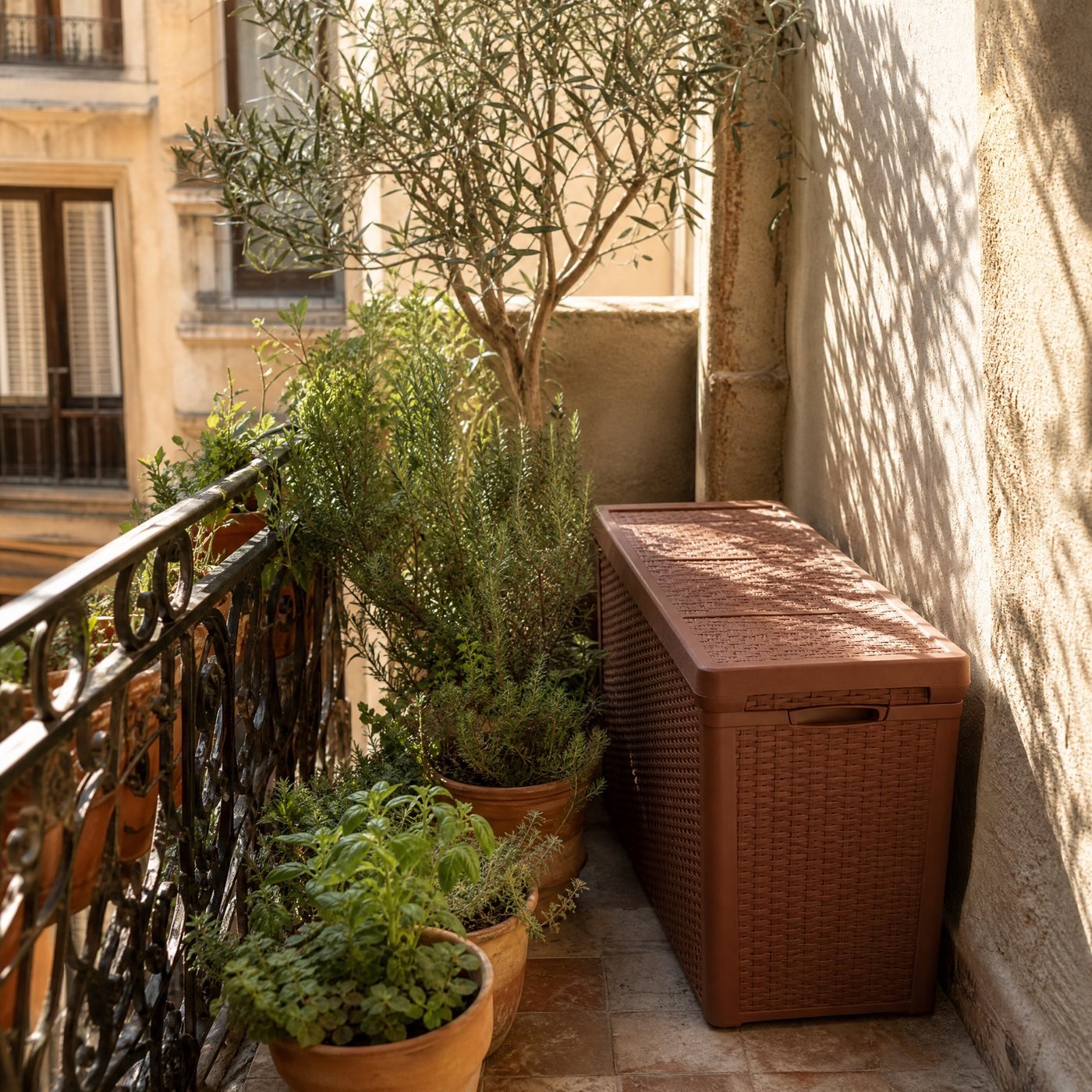 Balcony Storage Box, 70 L — a narrow city balcony with this slim storage box along the wall beside pots