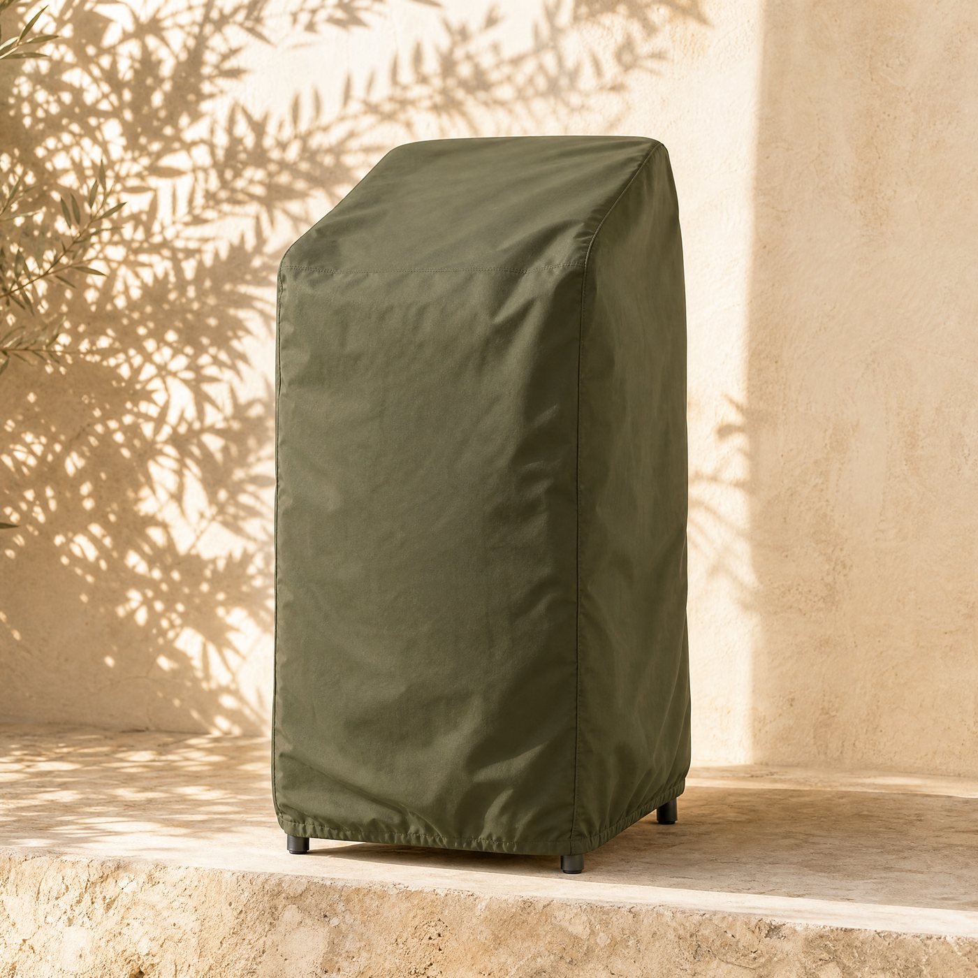 Stacking Chair Cover — a fitted olive-green polyester cover over a tall stack of garden chairs