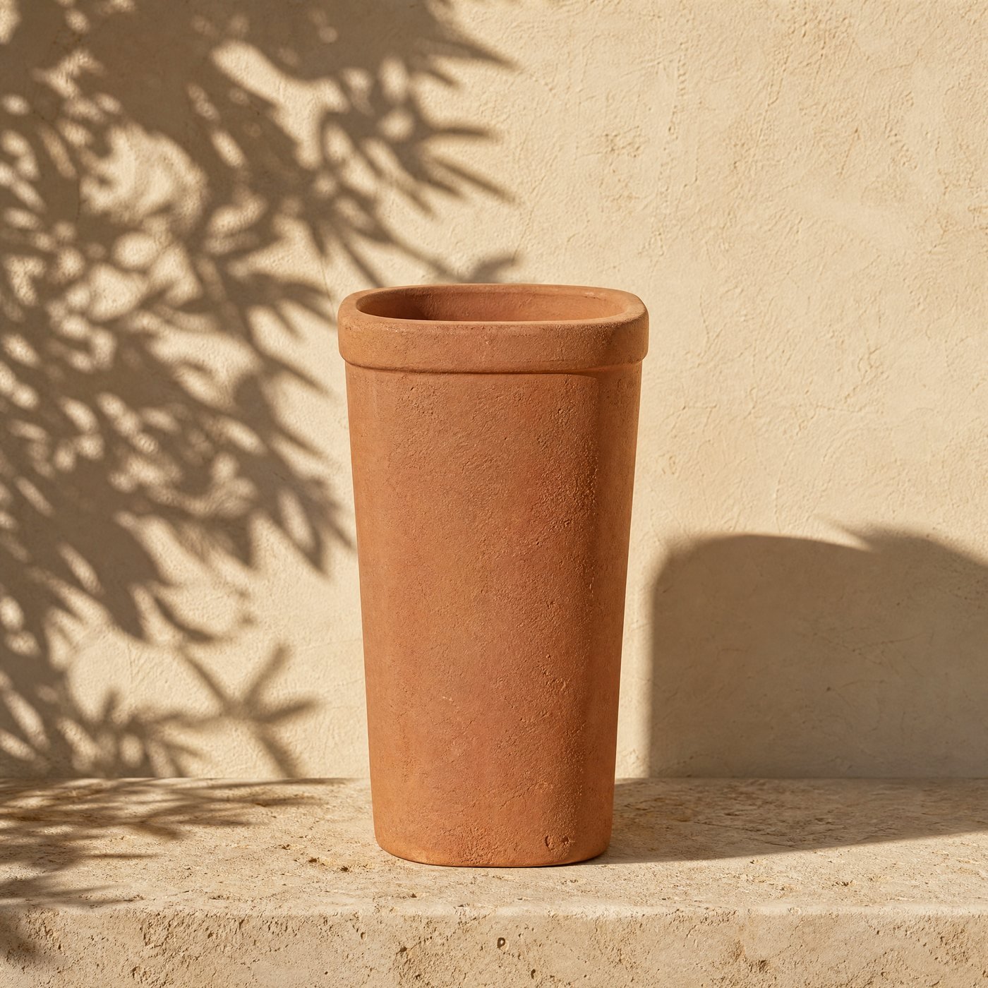 Long Tom Terracotta Pot, 14 cm — a tall narrow unglazed terracotta Long Tom pot, 14 cm wide and 20 cm tall, empty