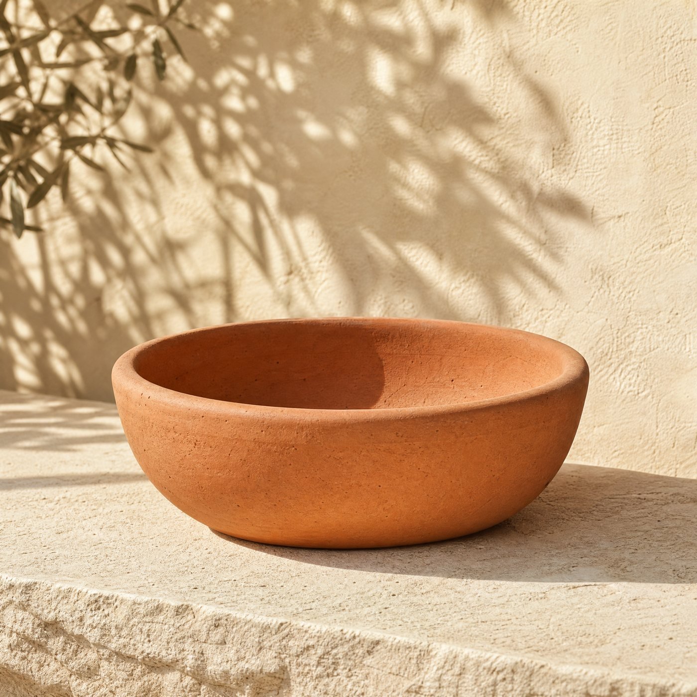 Low Terracotta Bowl Planter, 25 cm — a shallow wide unglazed terracotta bowl planter, 25 cm across and 10 cm deep, empty
